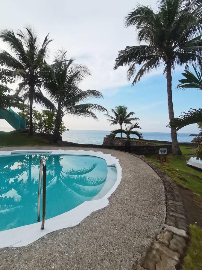 Puesta Del Sol Beach Bungalows And Restobar Mambajao Exterior photo